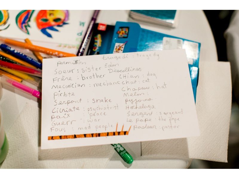A note card with a number of handwritten English-Lenape translations.